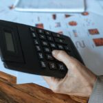 Life Balance, Achieving Success - Person Holding Black Desk Calculator