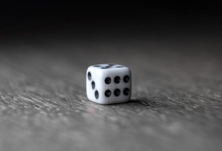 Meditation, Chances Of Success - Small white dice placed on wooden table