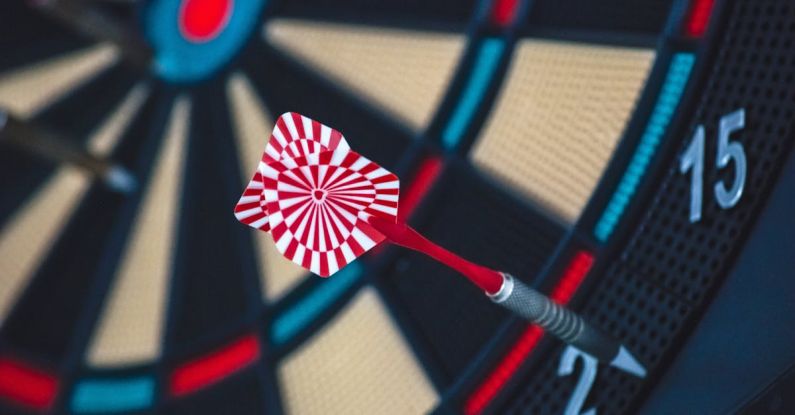 Success, Skill Enhancement - Red and White Dart on Darts Board