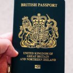 Great Leader, World - Crop unrecognizable person demonstrating British passport