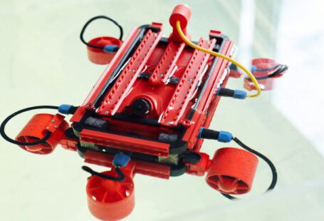 Robotics, Safety - Robot made with 3d printer with cables and wires against white background